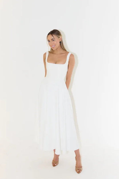 Edmee sleeveless A-line maxi dress in white, full-length front view