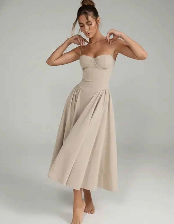 Ember women's sleeveless corset style midi dress in beige, front view on model