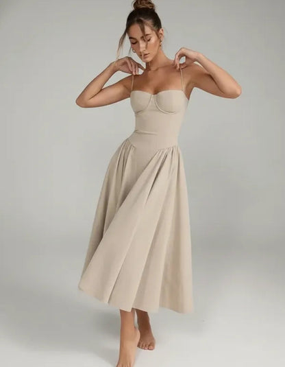 Ember women's sleeveless corset style midi dress in beige, front view on model