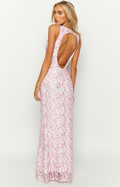 Back view of the pink Florine maxi dress with its open back cut-out