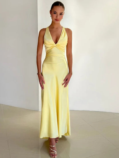 Joline women's sleeveless open back maxi dress in yellow satin, studio front view