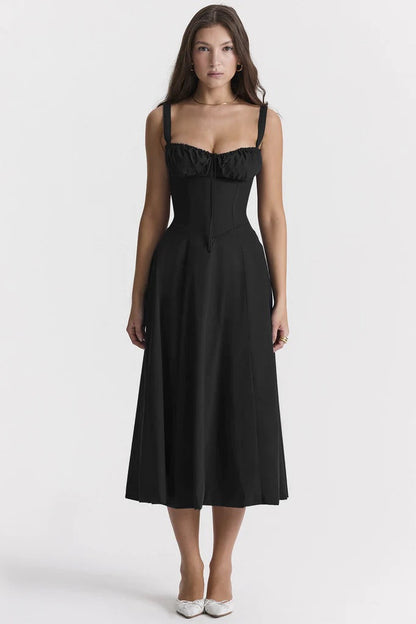 Ebba women's sleeveless summer midi dress in black, front view on model