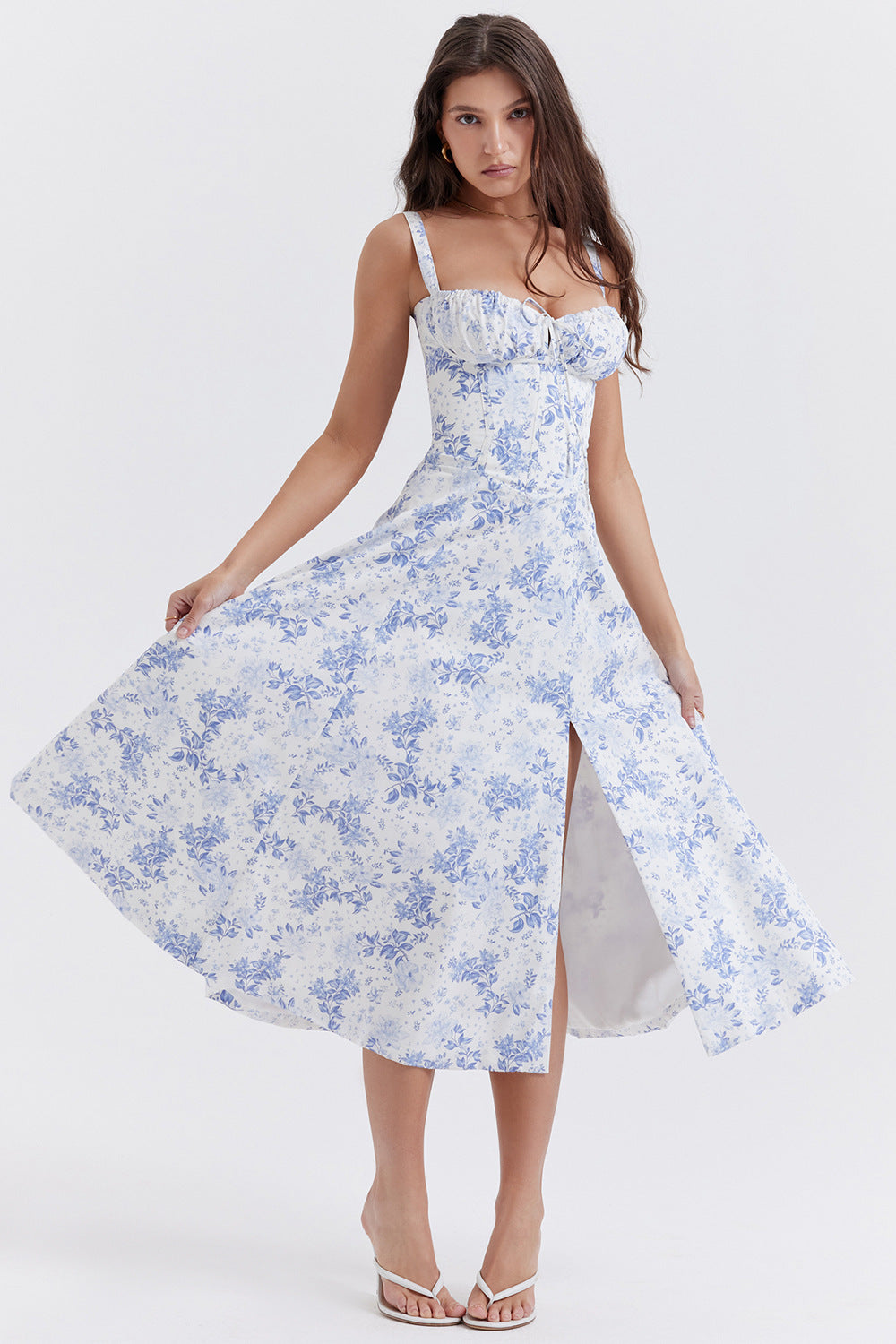 Ebba women's sleeveless summer midi dress in blue flower print, front view on model