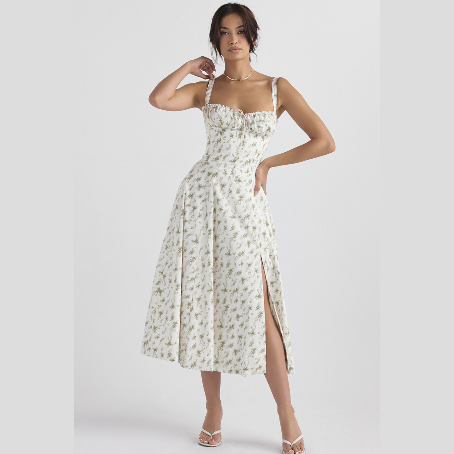 Ebba women's sleeveless summer midi dress in green flower print, front view on model