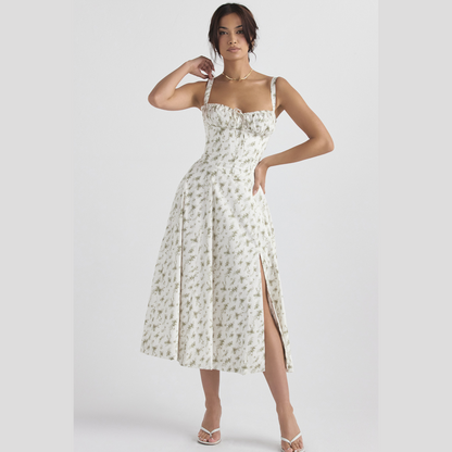Ebba women's sleeveless summer midi dress in green flower print, front view on model