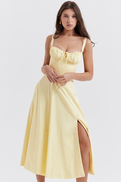 Ebba women's sleeveless summer midi dress in solid yellow, front view on model