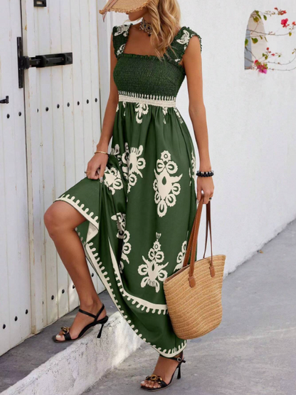 Dark green Lilias smocked printed maxi dress with cream baroque motifs, front view