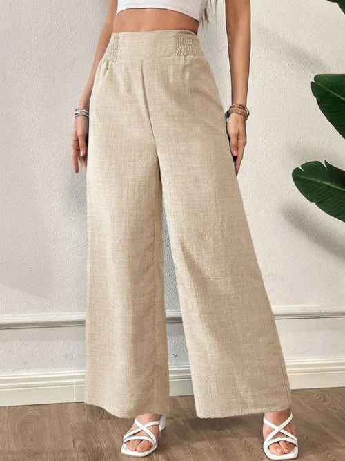 Elsie Women's Smocked Waist Wide Leg Pants in apricot beige, front view on model