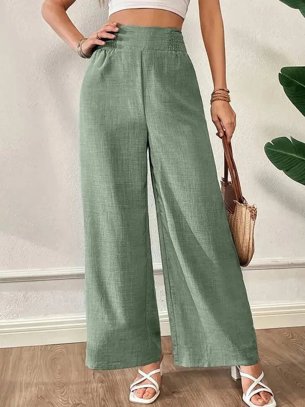 Elsie Women's Smocked Waist Wide Leg Pants in sage green, front view on model