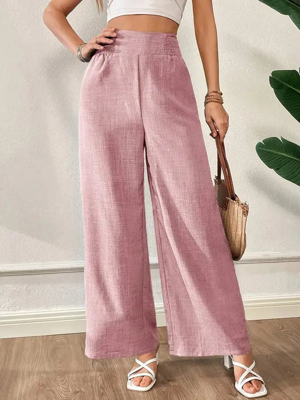 Elsie Women's Smocked Waist Wide Leg Pants in dusty pink, front view on model