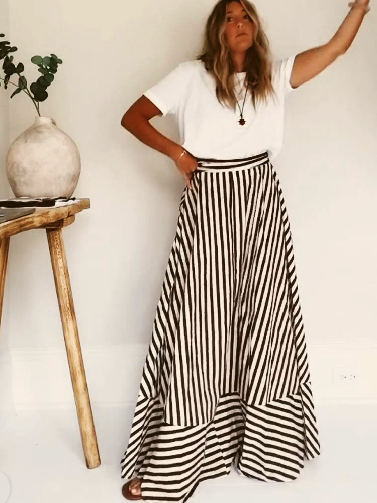 Orsolya striped maxi dress styled under a white tee so the skirt reads as separate