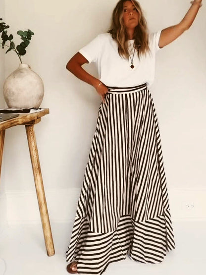 Orsolya striped maxi dress styled under a white tee so the skirt reads as separate