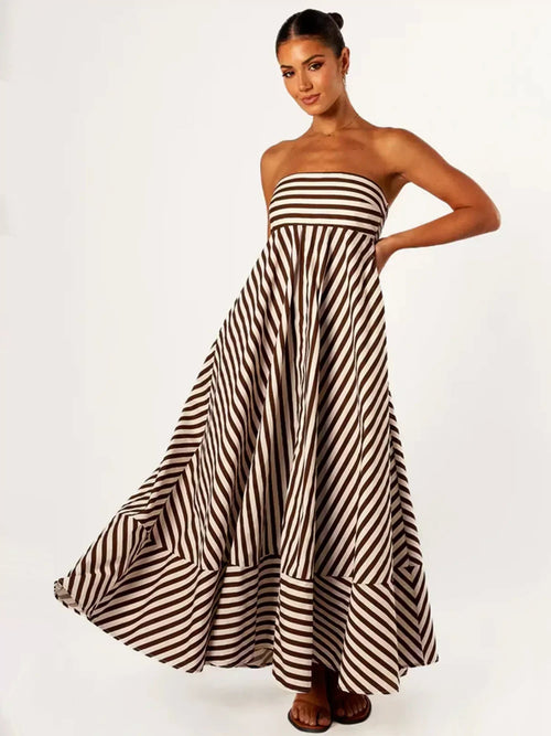Full length front view of the Orsolya strapless striped maxi dress on model