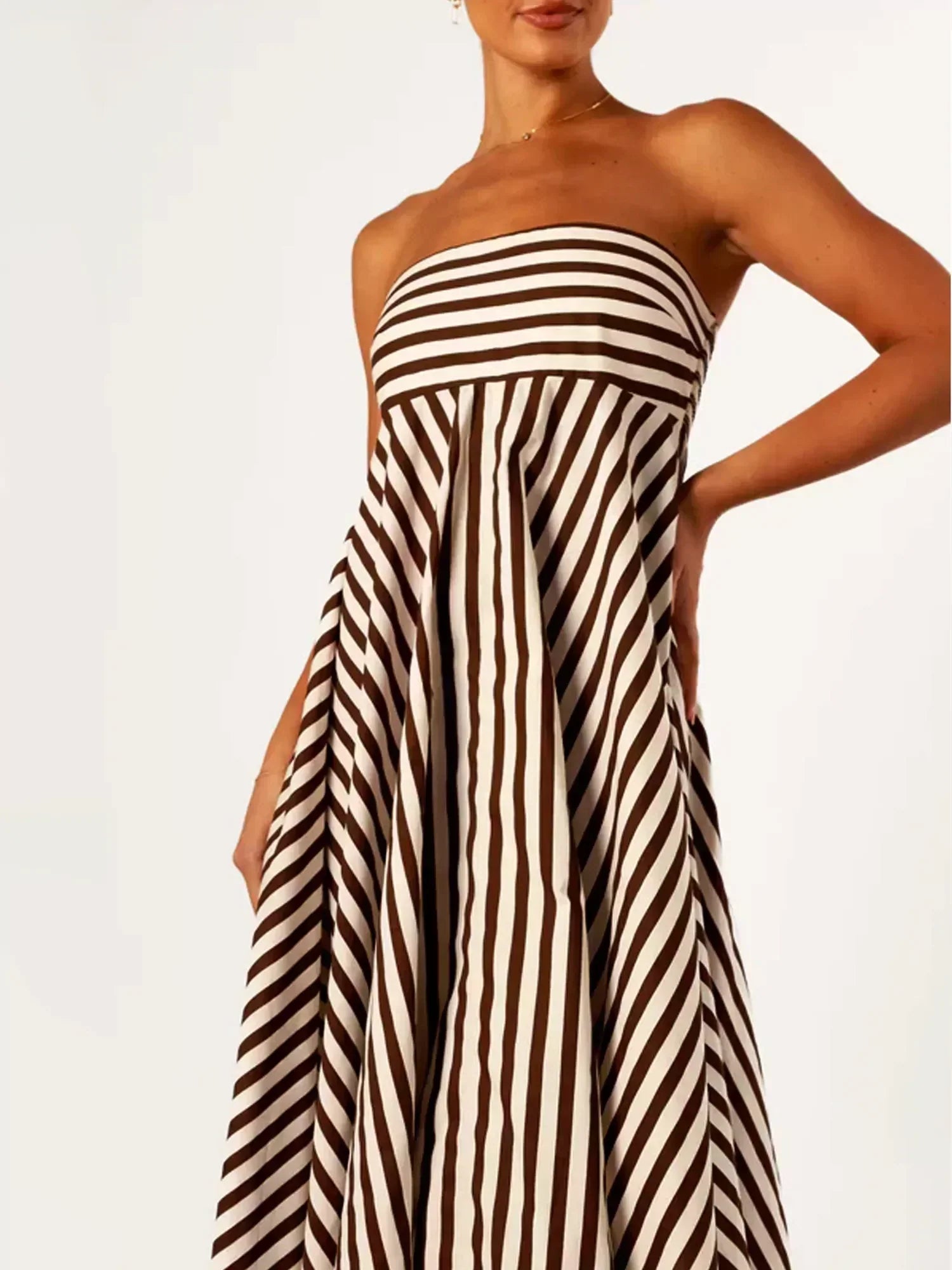 Close-up of the striped bodice and waist seam of the Orsolya strapless maxi dress