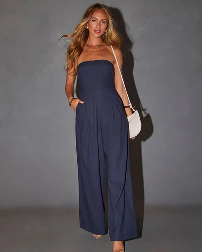 Navy blue Shadi women's strapless wide-leg cocktail jumpsuit with a clutch bag