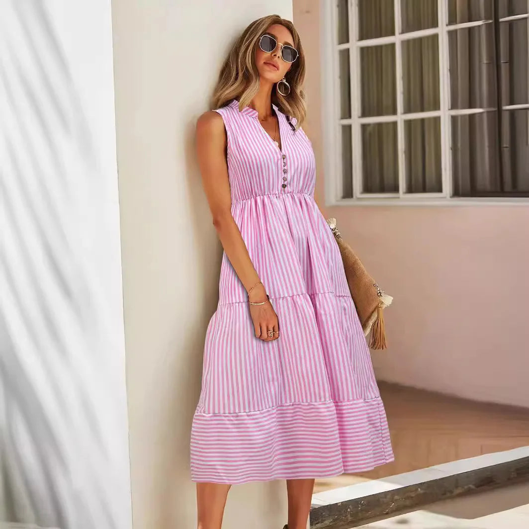 Violeta women's striped summer midi dress in pink stripes, second front view outdoors