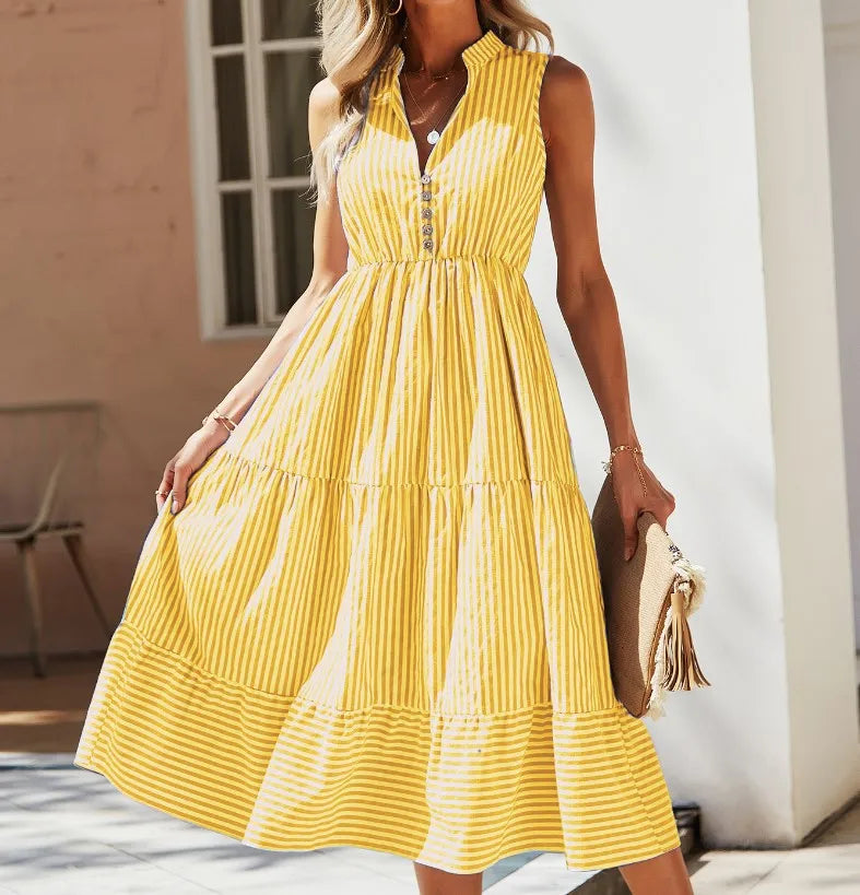 Violeta women's striped flowy summer midi dress in yellow stripes, front view on model