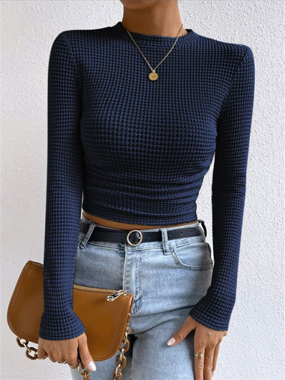 Danae Women's Textured Long Sleeve Crop Top in navy blue, front view with high neck