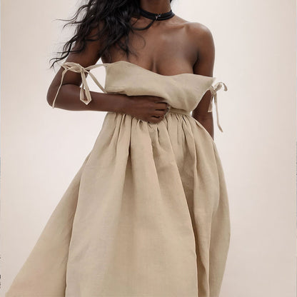 Close view of the khaki Eudora tie-strap maxi dress bodice and shoulder tie detail