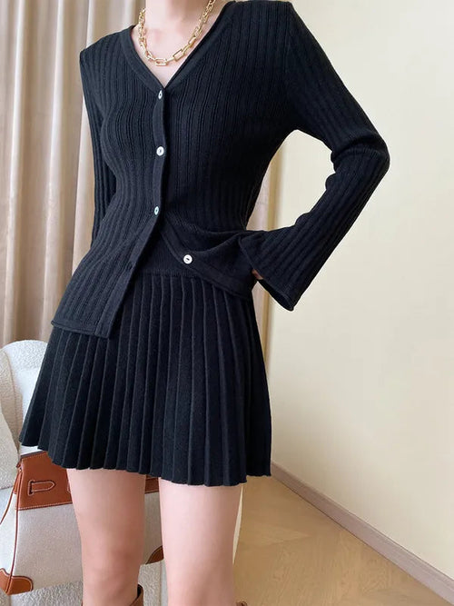 Lavinia ribbed cardigan and pleated skirt set in black, front view on model