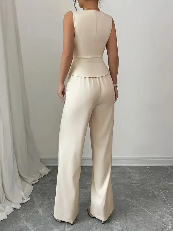 Fenella Women's Two-Piece Set in white, back view of peplum vest and pants