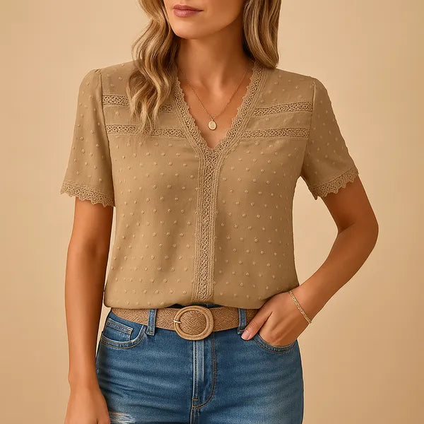 Eirene women's V-neck lace trim blouse in khaki, front view with denim shorts