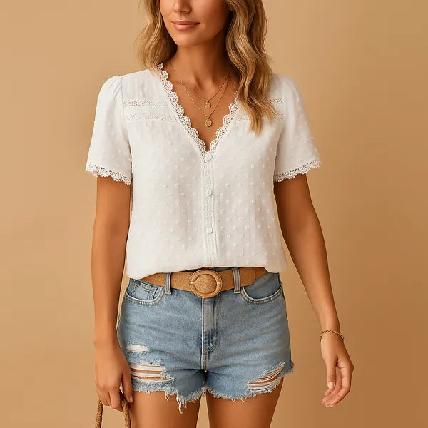 White Eirene women's V-neck lace trim blouse, front view buttoned on the model