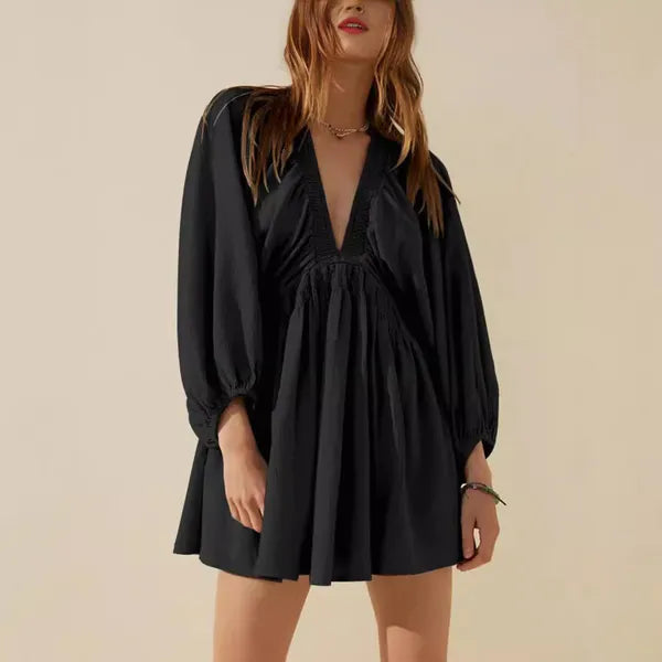 Black V-Neck Mini Dress front view with deep V neckline and billowy sleeves