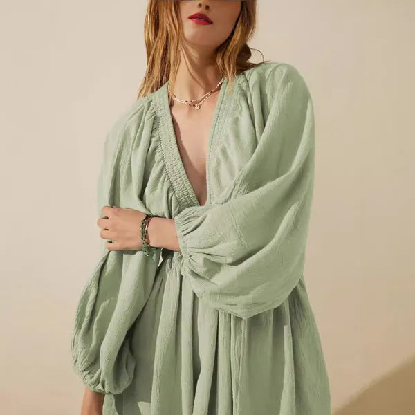 Sage Green V-Neck Mini Dress front close view of textured fabric and V neckline