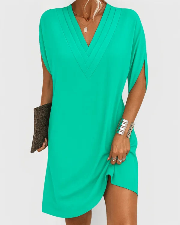 Jade Green V-Neck Mini Dress front view with V pintuck detail and split sleeve