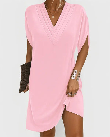 Pink V-Neck Mini Dress front view showing draped shift silhouette and side slit