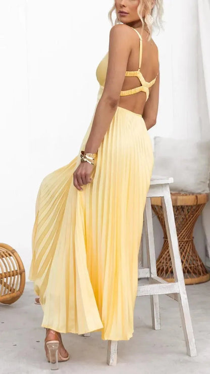 Back view of the Aveline women's yellow pleated maxi dress with strappy open back