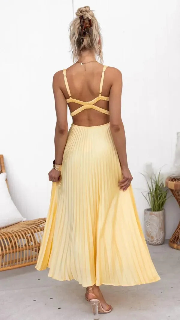 Aveline women's yellow V-neck pleated maxi dress, back view of the criss-cross straps