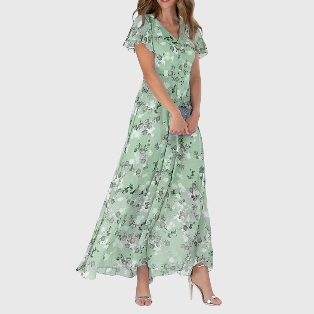 Millicent women's floral wedding guest maxi dress in green, front view on model