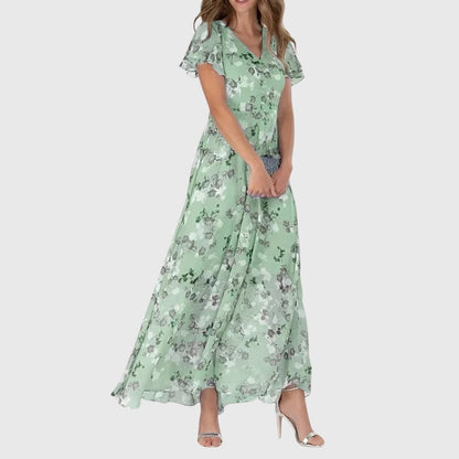 Millicent women's floral wedding guest maxi dress in green, front view on model