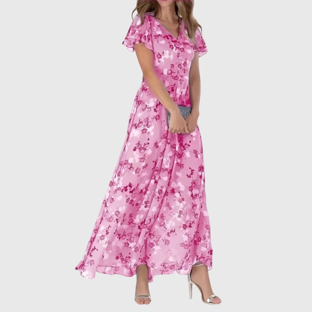 Light pink Millicent women's wedding guest floral maxi dress, front view on model