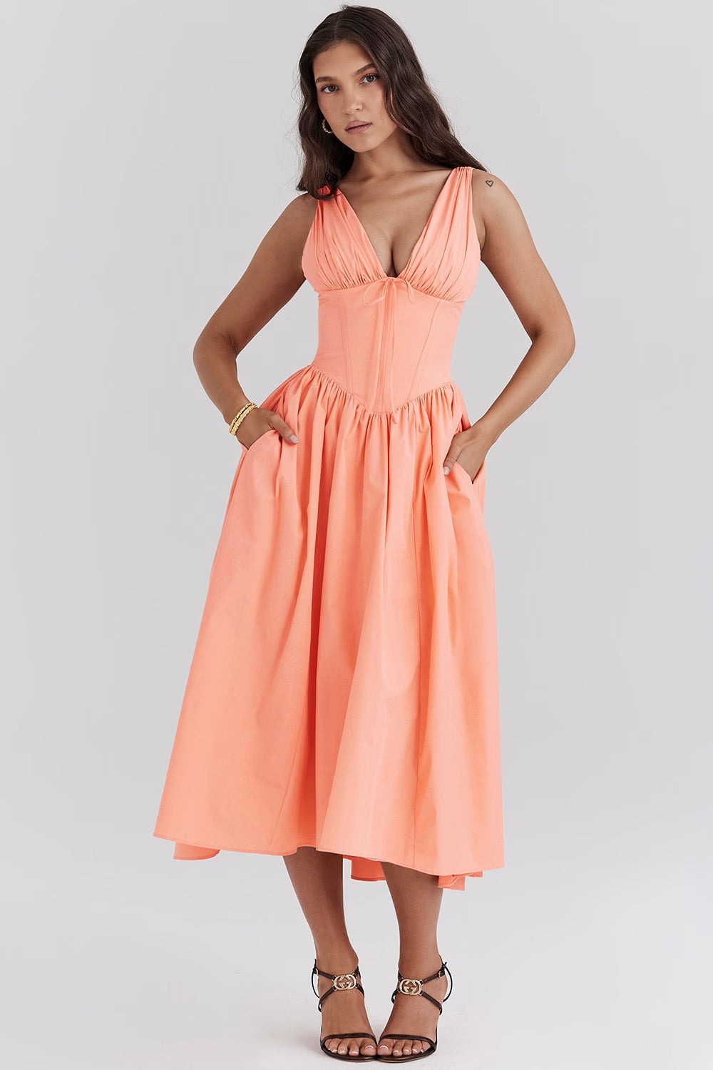 Women's Wedding Guest Floral Midi Dress – Persephone in Peach, front view on model