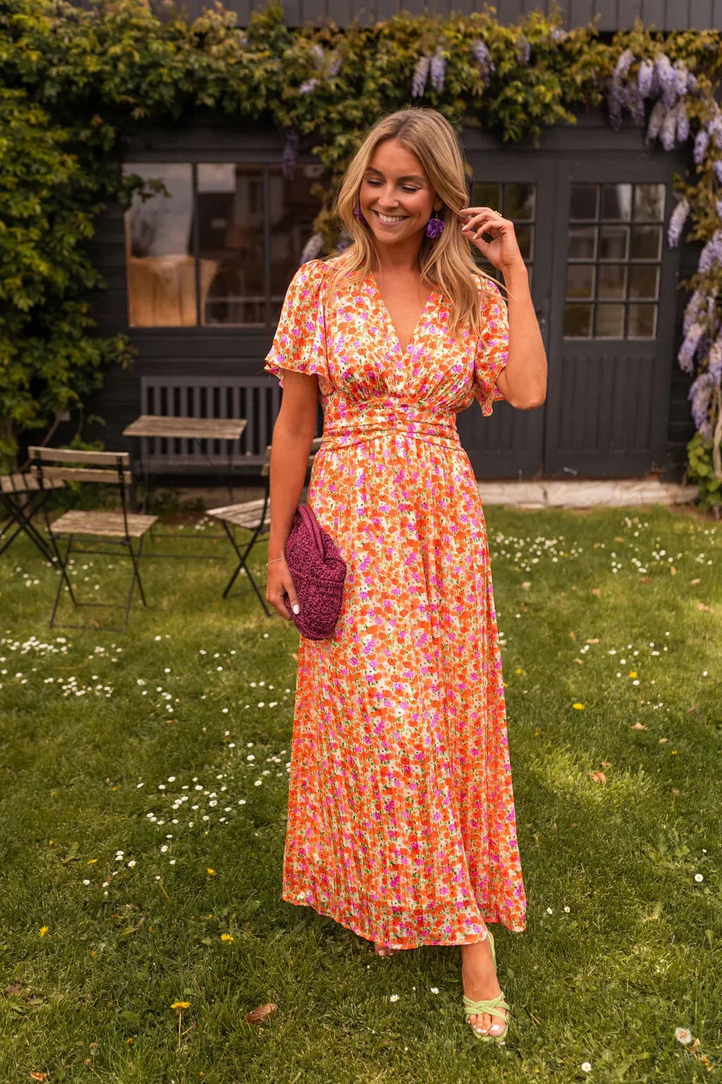 Honoria women's wedding guest floral wrap summer maxi dress in orange, front view