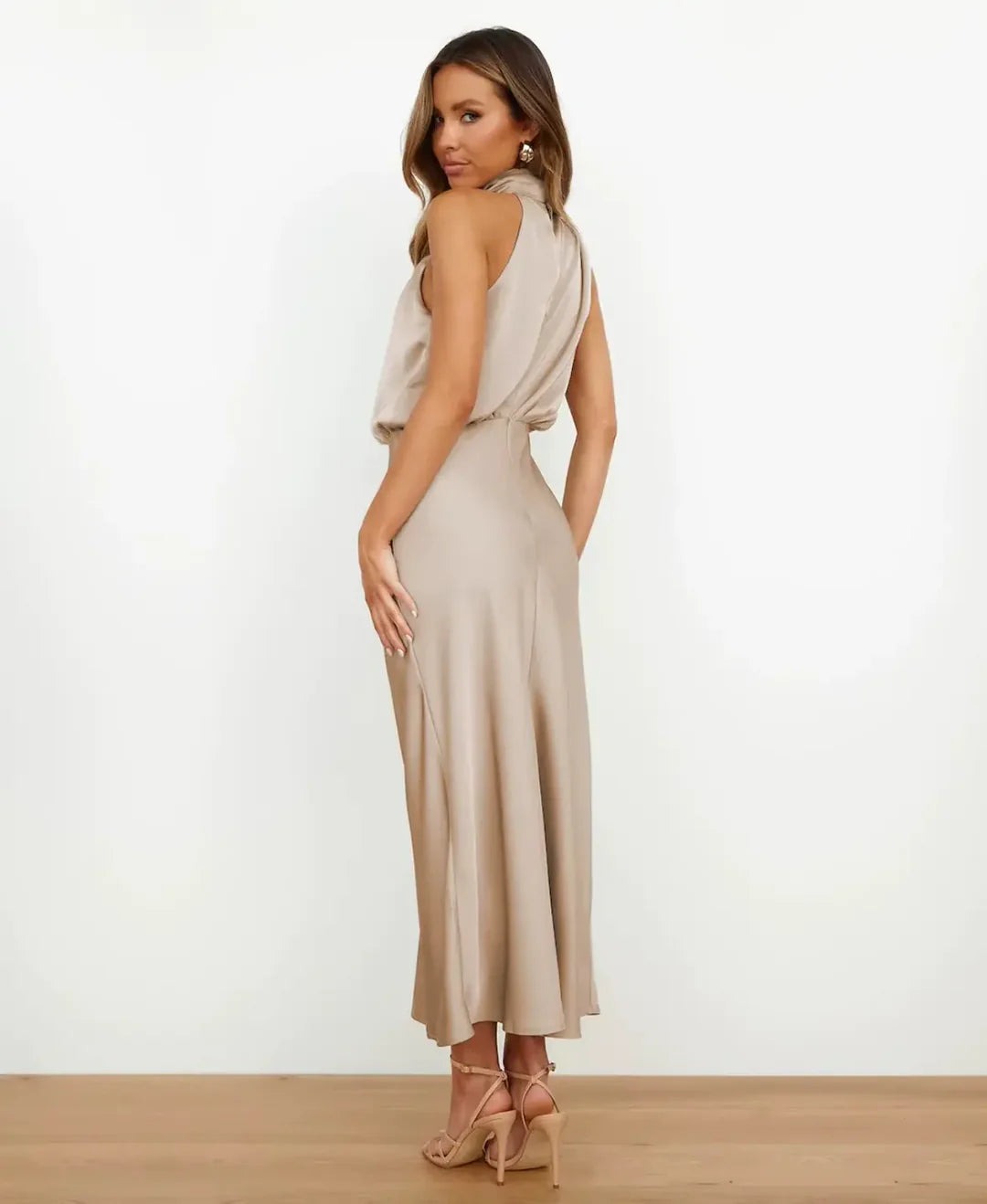 Women's Wedding Guest Satin Midi Dress – Guinevere in Apricot, back view on model