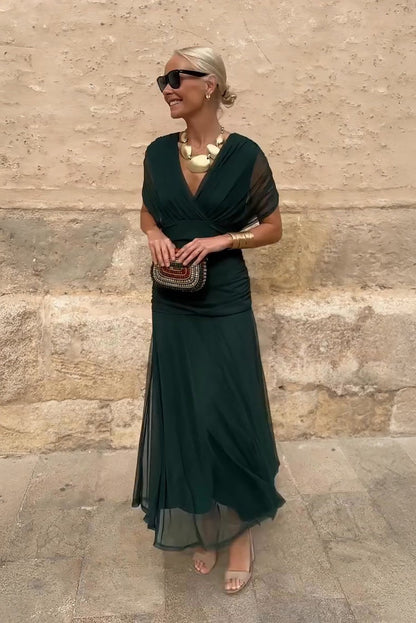 Women's Wedding Guest Satin Midi Dress – Hermione in Green, front view on model