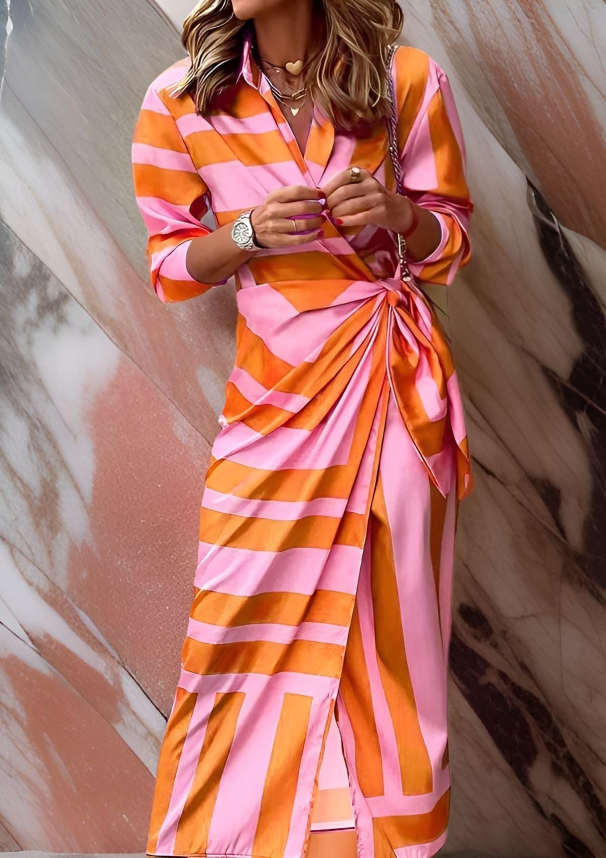 Sassa orange wrap midi dress, front view of tied waist and striped satin print